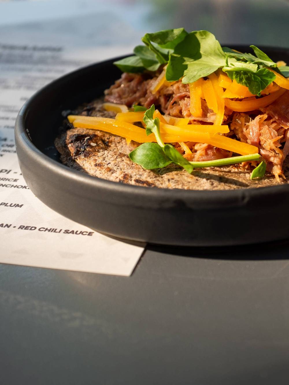 Meet Minneapolis The menu at Owamni the menu avoids dairy, wheat, flour, cane sugar, beef, chicken and pork—colonial ingredients that are not originally from the land. The duck taco is a favourite.