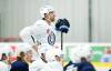 Blake Wheeler listens to new head coach Rick Bowness during the opening day of Jets training camp Thursday in Winnipeg. (John Woods / The Canadian Press)