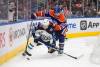 JASON FRANSON / THE CANADIAN PRESS
                                Winnipeg Jets’ Cole Perfetti (front) and Edmonton Oilers’ Ryan Murray battle for the puck during NHL pre-season action in Edmonton on Sunday.