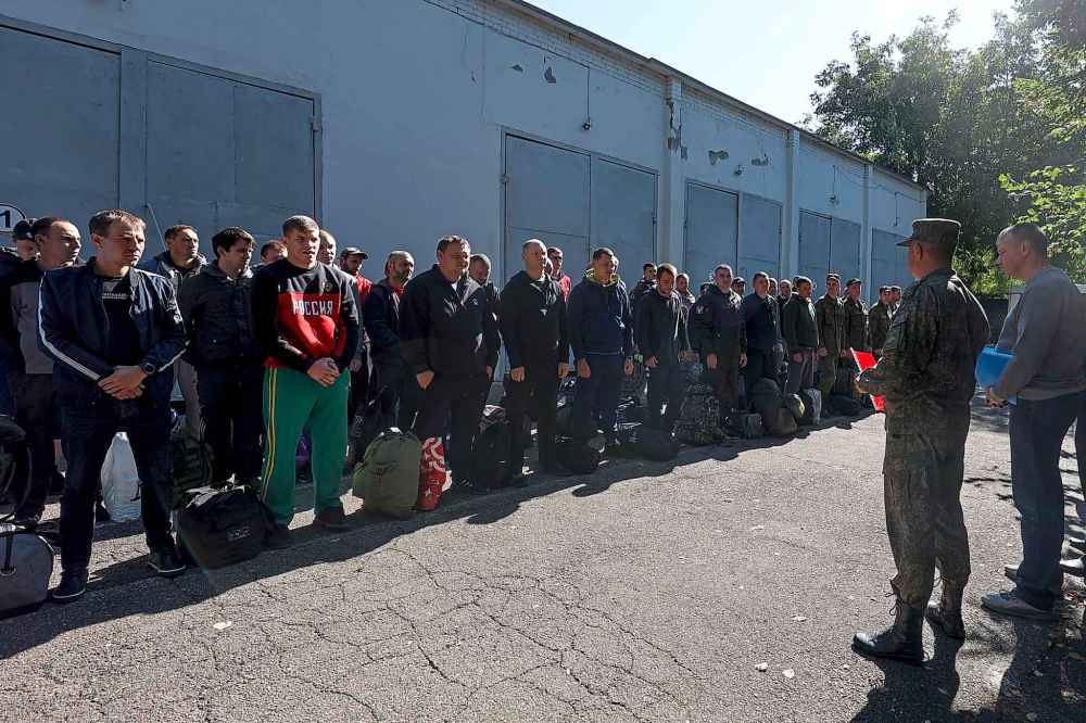 Russian recruits stand near a military recruitment center in Krasnodar, Russia, Sunday, Sept. 25, 2022. Russian President Vladimir Putin on Wednesday ordered a partial mobilization of reservists to beef up his forces in Ukraine. (AP Photo)
