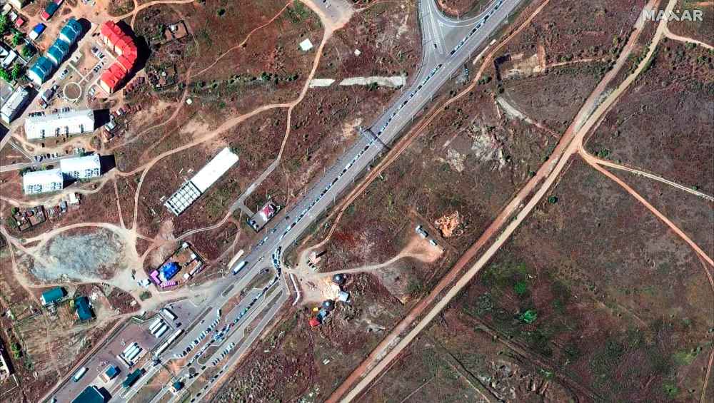 This satellite image provided by Maxar Technologies on Sept. 26, 2022, shows an overview of the border crossing between Russia and Mongolia, at the Khyagt border post on Sept. 23, 2022 after Russian President Vladamir Putin announced a partial mobilization in Russia. (Satellite image ©2022 Maxar Technologies via AP)