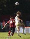 Bournemouth's Dominic Solanke, left, and Leicester City's Wout Faes battle for the ball during the English Premier League soccer match at Vitality Stadium, Bournemouth, England, Saturday Oct. 8, 2022. (Adam Davy/PA via AP)