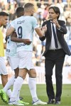 Inter Milan's head coach Simone Inzaghi, right, celebrates with Inter's Edin Dzeko after the Italian Serie A soccer match between Sassuolo and Inter Milan at the Mapei stadium in Reggio Emilia, Italy, Saturday, Oct. 8, 2022. (Massimo Paolone/LaPresse via AP)