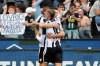 Udinese's Nehuen Perez is embraced by teammate Gerard Deulofeu after scoring his side's second goal during the Italian Serie A soccer match between Udinese and Atalanta at the Friuli Stadium in Udine, Italy, Saturday, Oct. 9, 2022. (Andrea Bressanutti/LaPresse via AP)