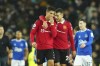 Manchester United's Cristiano Ronaldo talks with teammate Diogo Dalot, center right, at the end of the Premier League soccer match between Everton and Manchester United at Goodison Park, in Liverpool, England, Sunday Oct. 9, 2022. Manchester United won 2-1 with a goal by Ronaldo. (AP Photo/Jon Super)