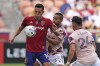 Portland Timbers defender Bill Tuiloma (25) defends against Real Salt Lake forward Rubio Rubin (14) during the first half of an MLS soccer match Sunday, Oct. 9, 2022, in Sandy, Utah. (AP Photo/Rick Bowmer)