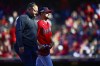 Cleveland Guardians pitcher Nick Sandlin, right, leaves the game in the tenth inning of a wild card baseball playoff game against the Tampa Bay Rays, Saturday, Oct. 8, 2022, in Cleveland. (AP Photo/David Dermer)