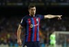 Barcelona's Robert Lewandowski gestures during a Spanish La Liga soccer match between FC Barcelona and Celta Vigo at Camp Nou stadium in Barcelona, Spain, Sunday, Oct. 9, 2022. (AP Photo/Joan Monfort)