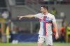 Barcelona's Robert Lewandowski gives instructions during the Champions League group C soccer match between Inter Milan and Barcelona at the San Siro stadium in Milan, Italy, Tuesday, Oct. 4, 2022. (AP Photo/Luca Bruno)