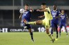 Udinese's Perez Nehuen, right, fights for the ball with Verona's Simone Verdi during the Serie A soccer match between Hellas Verona and Udinese, at Marcantonio Bentegodi stadium in Verona, Italy, Monday, Oct. 3, 2022. (Paola Garbuio/LaPresse via AP)