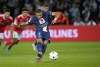 PSG's Kylian Mbappe scores his side's opening goal from penalty during the Champions League Group H soccer match between Paris Saint Germain and Benfica, at the Parc des Princes stadium, in Paris, France, Tuesday, Oct. 11, 2022. (AP Photo/Francois Mori)
