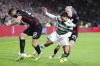 Celtic's Sead Haksabanovic, center, and Leipzig's Josko Gvardiol, left, and Xaver Schlager battle for the ball during the Group F Champions League soccer match between RB Leipzig and Celtic at the Celtic Park stadium in Glasgow, Scotland, Tuesday, Oct. 11, 2022. (Steve Welsh/PA via AP)