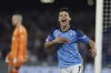 Napoli's Hirving Lozano celebrates scoring the opening goal during the group A Champions League soccer match between Napoli and Ajax at the Diego Armando Maradona stadium in Naples, Italy, Wednesday, Oct. 12, 2022. (Alessandro Garofalo/LaPresse via AP)
