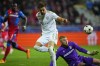 Bayern's Leon Goretzka, left, challenges for the ball with Plzen's goalkeeper Jindrich Stanek during the Champions League group C soccer match between Viktoria Plzen and Bayern Munich at the Doosan Arena in Plzen, Czech Republic, Wednesday, Oct. 12, 2022. (AP Photo/Petr David Josek)