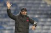 Liverpool's manager Jurgen Klopp celebrates after the Champions League Group A soccer match between Rangers and Liverpool at Ibrox stadium in Glasgow, Scotland, Wednesday, Oct. 12, 2022. (AP Photo/Scott Heppell)