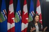 Alberta Premier Danielle Smith holds her first press conference in Edmonton, on Tuesday Oct. 11, 2022. Alberta’s Opposition NDP leader says Smith is making the province an international embarrassment by proclaiming those who didn’t get vaccinated during COVID-19 endured the worst discrimination she's seen in her lifetime.THE CANADIAN PRESS/Jason Franson