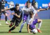 CF Montreal's Joaquin Torres, left, breaks away from Orlando City's Rodrigo Schlegel, right, during first half MLS soccer action in Montreal, Saturday, May 7, 2022. Currently riding a six-game unbeaten run and winners of eight of their last 10 matches, CF Montreal could not be in better form heading into its first Major League Soccer playoff game since 2016. THE CANADIAN PRESS/Graham Hughes