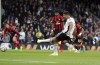 Fulham's Aleksandar Mitrovic scores his side's second goal from the penalty spot, during the English Premier League soccer match between Fulham and Bournemouth, at Craven Cottage, London, Saturday, Oct, 15, 2022. (Adam Davy/PA via AP)