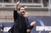 Monza's coach Raffaele Palladino shouts indications to his players during a Serie A soccer match between Empoli and Monza at Castellani Stadium in Empoli, Italy, Saturday Oct. 15, 2022. (Marco Bucco/LaPresse via AP)