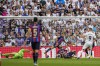 Real Madrid's Karim Benzema scores the opening goal during La Liga soccer match between Real Madrid and FC Barcelona in Madrid, Spain, Sunday, Oct. 16, 2022. (AP Photo/Bernat Armangue)