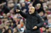 Manchester City's head coach Pep Guardiola reacts during the English Premier League soccer match between Liverpool and Manchester City at Anfield stadium in Liverpool, Sunday, Oct. 16, 2022. (AP Photo/Jon Super)