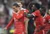 Bayern's Leroy Sane, left, and teammate&nbsp;Alphonso Davies celebrate after scoring his side's third goal during the German Bundesliga soccer match between FC Bayern Munich and SC Freiburg at the Allianz Arena in Munich, Germany, Oct. 16, 2022. THE CANADIAN PRESS/AP-Matthias Schrader