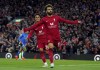 Liverpool's Mohamed Salah celebrates after scoring his side's opening goal during the English Premier League soccer match between Liverpool and Manchester City at Anfield stadium in Liverpool, Sunday, Oct. 16, 2022. 
 (Peter Byrne/PA via AP)