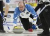 Quebec Skip Jean-Michel Menard throws a rock during the Tim Hortons Brier curling championship at Mile One Centre, in St. John's on Saturday, March 4, 2017.&nbsp;Menard led his rink to a 7-6 extra-end victory over previously unbeaten South Korea at the world mixed curling championships on Monday. THE CANADIAN PRESS/Andrew Vaughan