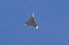 A drone is seen in the sky seconds before it fired on buildings in Kyiv, Ukraine, Monday, Oct. 17, 2022. (AP Photo/Efrem Lukatsky)