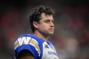 Winnipeg Blue Bombers quarterback Zach Collaros, who dressed but did not play, watches from the sideline during the second half of a CFL football game against the B.C. Lions in Vancouver, on Saturday, Oct. 15, 2022. Five teams have clinched CFL playoff berths but only Zach Collaros and the Grey Cup-champion Winnipeg Blue Bombers know when and where they'll be once the postseason begins. THE CANADIAN PRESS/Darryl Dyck