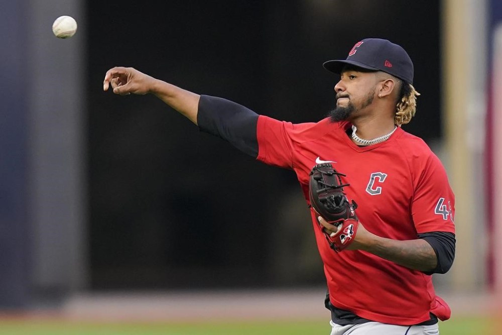 Cleveland Guardians relief pitcher Emmanuel Clase warms up before Game 5 of an American League Division baseball series against the New York Yankees, Monday, Oct. 17, 2022, in New York. (AP Photo/Frank Franklin II)