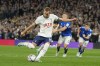 Tottenham's Harry Kane scores the opening goal from the penalty spot during the English Premier League soccer match between Tottenham Hotspur and Everton at the Tottenham Hotspur Stadium in London, England, Saturday, Oct. 15, 2022. (AP Photo/Kin Cheung)