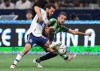 Vancouver Whitecaps' Russell Teibert, left, and Austin FC's Maxi Urruti vie for the ball during the first half of an MLS soccer game in Vancouver, on Saturday, October 1, 2022.&nbsp;Teibert has undergone successful surgery on his right ankle. THE&nbsp;CANADIAN PRESS/Darryl Dyck