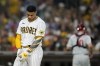 San Diego Padres' Juan Soto reacts after striking out during the sixth inning in Game 1 of the baseball NL Championship Series between the San Diego Padres and the Philadelphia Phillies on Tuesday, Oct. 18, 2022, in San Diego. (AP Photo/Brynn Anderson)