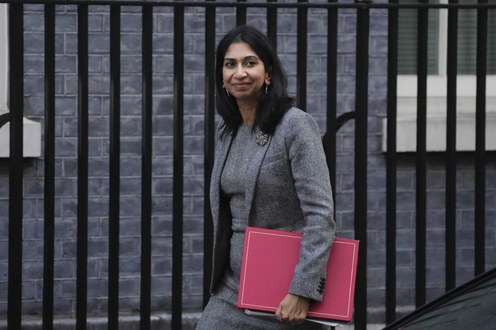 FILE - Suella Braverman, Britain's Home Secretary arrives for a cabinet meeting at 10 Downing Street in London, Oct. 18, 2022. British Home Secretary Suella Braverman left her job on Wednesday Oct. 19, 2022, the second senior minister in a week to leave Prime Minister Liz Truss’ government. (AP Photo/Kin Cheung, File)
