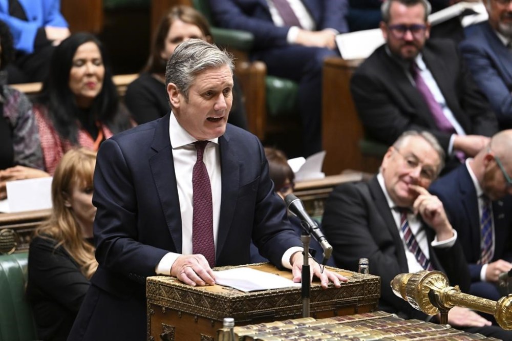 In this handout photo provided by UK Parliament, Labour Party leader Keir Starmer speaks during Prime Minister's Questions in the House of Commons in London, Wednesday, Oct. 19, 2022. (Jessica Taylor/UK Parliament via AP)