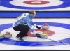 Quebec skip Jean-Michel Menard directs the sweep as they play British Columbia in draw 9 action at the Tim Hortons Brier curling championship at Mile One Centre in St. John's on Tuesday, March 7, 2017. THE CANADIAN PRESS/Andrew Vaughan