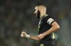 Real Madrid's Karim Benzema celebrates after scoring his sides second goal during the Spanish La Liga soccer match between Elche and Real Madrid at the Martinez Valero Stadium in Elche, Spain, Wednesday, Oct. 19, 2022. (AP Photo/Alberto Saiz)