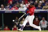 Cleveland Guardians' Jose Ramirez hits an RBI-single in the third inning of Game 4 of a baseball AL Division Series against the New York Yankees, Sunday, Oct. 16, 2022, in Cleveland. (AP Photo/David Dermer)