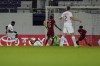Canada's Jonathan David, left, scores his side second goal against Qatar during the international friendly soccer match between Qatar and Canada, at the Viola Park stadium in Vienna, Austria, Friday, Sept. 23, 2022. (AP Photo/Florian Schroetter)