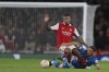 Arsenal's Thomas Partey, left, and PSV's Armando Obispo fight for the ball during the Europa League soccer match between Arsenal and PSV at Emirates stadium in London, Thursday, Oct. 20, 2022. (AP Photo/Ian Walton)