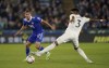 Leicester City's Timothy Castagne, left, and Leeds United's Junior Firpo in action battle for the ball during the English Premier League soccer match at the King Power Stadium, Leicester, England, Thursday Oct. 20, 2022. (Nick Potts/PA via AP)