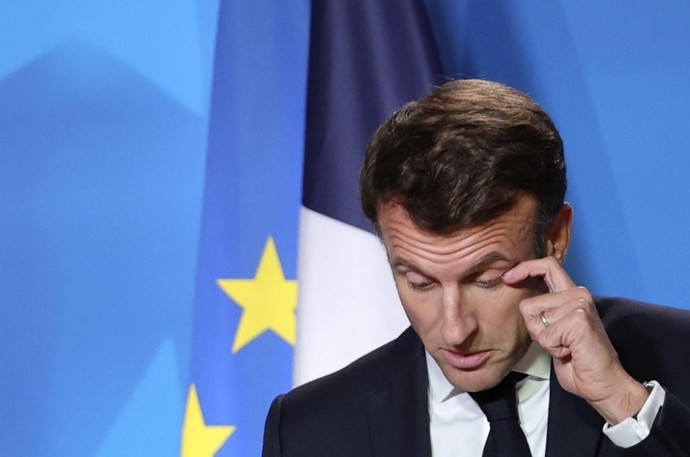 French President Emmanuel Macron pauses before speaking during a media conference at an EU summit in Brussels, Friday, Oct. 21, 2022. European Union leaders gathered Friday to take stock of their support for Ukraine after President Volodymyr Zelenskyy warned that Russia is trying to spark a refugee exodus by destroying his war-ravaged country's energy infrastructure. (AP Photo/Olivier Matthys)