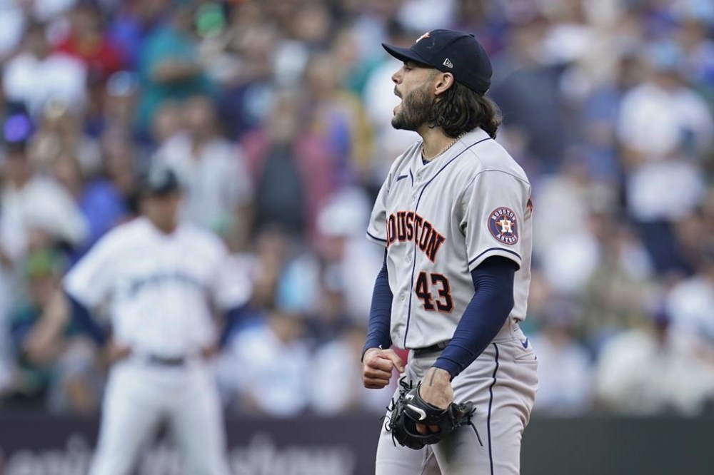 Houston Astros starting pitcher Lance McCullers Jr. (43) reacts after striking out Seattle Mariners catcher Cal Raleigh during the sixth inning in Game 3 of an American League Division Series baseball game Saturday, Oct. 15, 2022, in Seattle. (AP Photo/Abbie Parr)