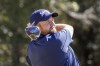 Shane Lowry of Ireland watches his shot down the 12th fairway during the first round of the CJ Cup golf tournament Thursday, Oct. 20, 2022, in Ridgeland, S.C. (AP Photo/Stephen B. Morton)