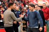 Leverkusen's coach Xabier Alonso, left, and Wolfsburg coach Niko Kovac greet each other before the German Bundesliga soccer match between Leverkusen and Wolfsburg in Leverkusen, Saturday Oct. 22, 2022. (Federico Gambarini/dpa via AP)