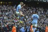 Manchester City's Erling Haaland celebrates after scoring his side's opening goal during the English Premier League soccer match between Manchester City and Brighton and Hove Albion at Etihad stadium in Manchester, England, Saturday, Oct. 22, 2022. (AP Photo/Rui Vieira)