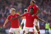 Nottingham Forest's Taiwo Awoniyi celebrates with his team-mates after scoring their side's first goal of the game during the English Premier League soccer match between Nottingham Forest and Liverpool, at the City Ground, in Nottingham, England, Saturday, Oct. 22, 2022. (Joe Giddens/PA via AP)