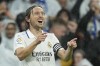 Real Madrid's Luka Modric celebrates after scoring the opening goal during the Spanish La Liga soccer match between Real Madrid and Sevilla at the Santiago Bernabeu stadium in Madrid, Saturday, Oct. 22, 2022. (AP Photo/Manu Fernandez)