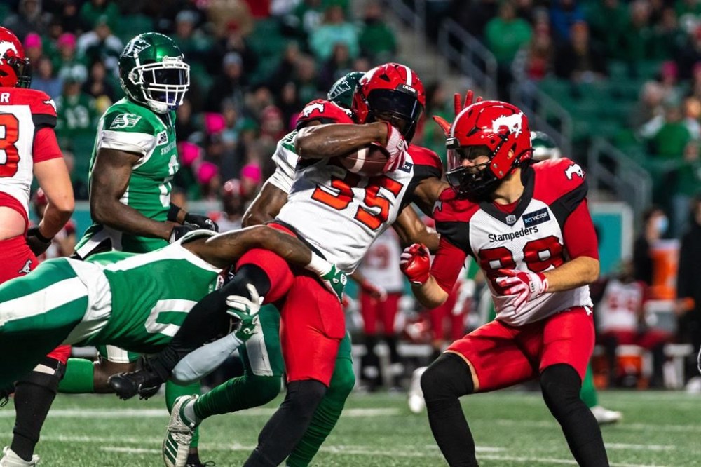 Calgary Stampeders running back Ka'Deem Carey (35) runs the football against the Saskatchewan Roughriders during the first half of CFL football action in Regina on Saturday, October 22, 2022. THE CANADIAN PRESS/Heywood Yu
